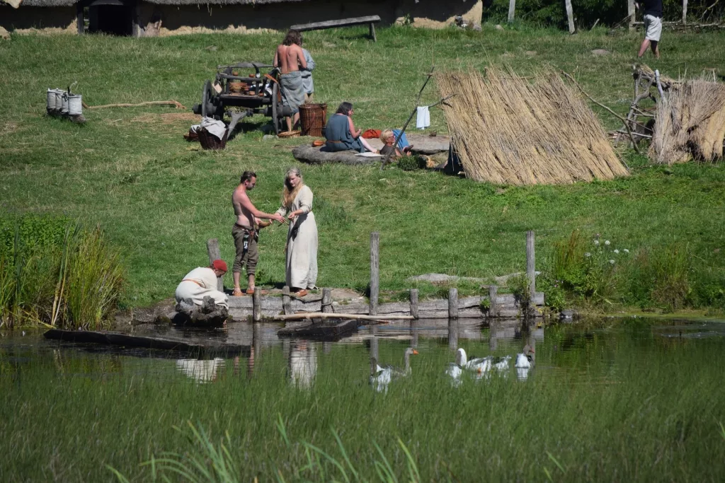 old type Viking village with man and woman