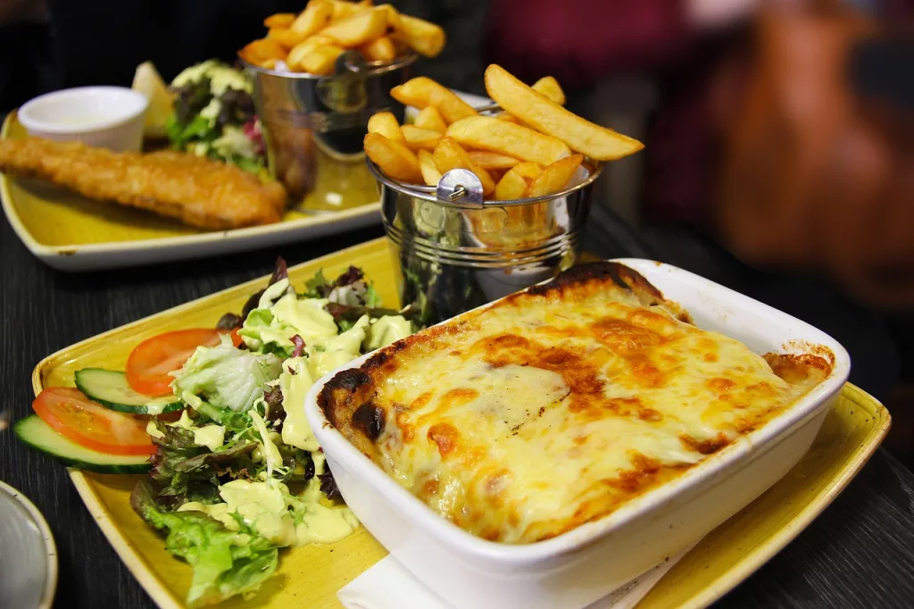 2 meals one of lasagne and second of fish and chips