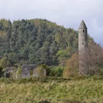 glendalough stone tower and old buildings