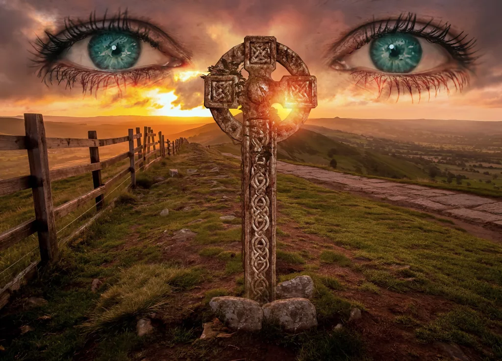 womans eyes overlooking a celtic cross